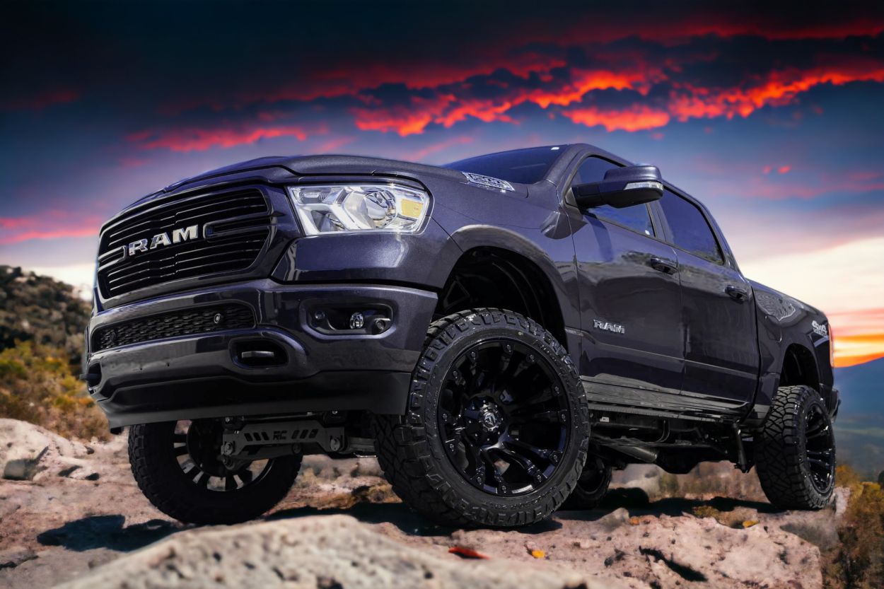 Ram 1500 DT with Fuel Vapor rims and Rough Country booster kit